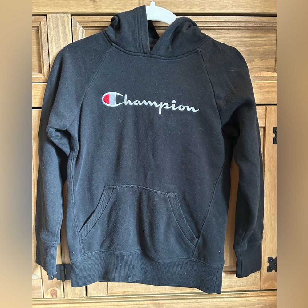 Kids size medium black champion hoodie